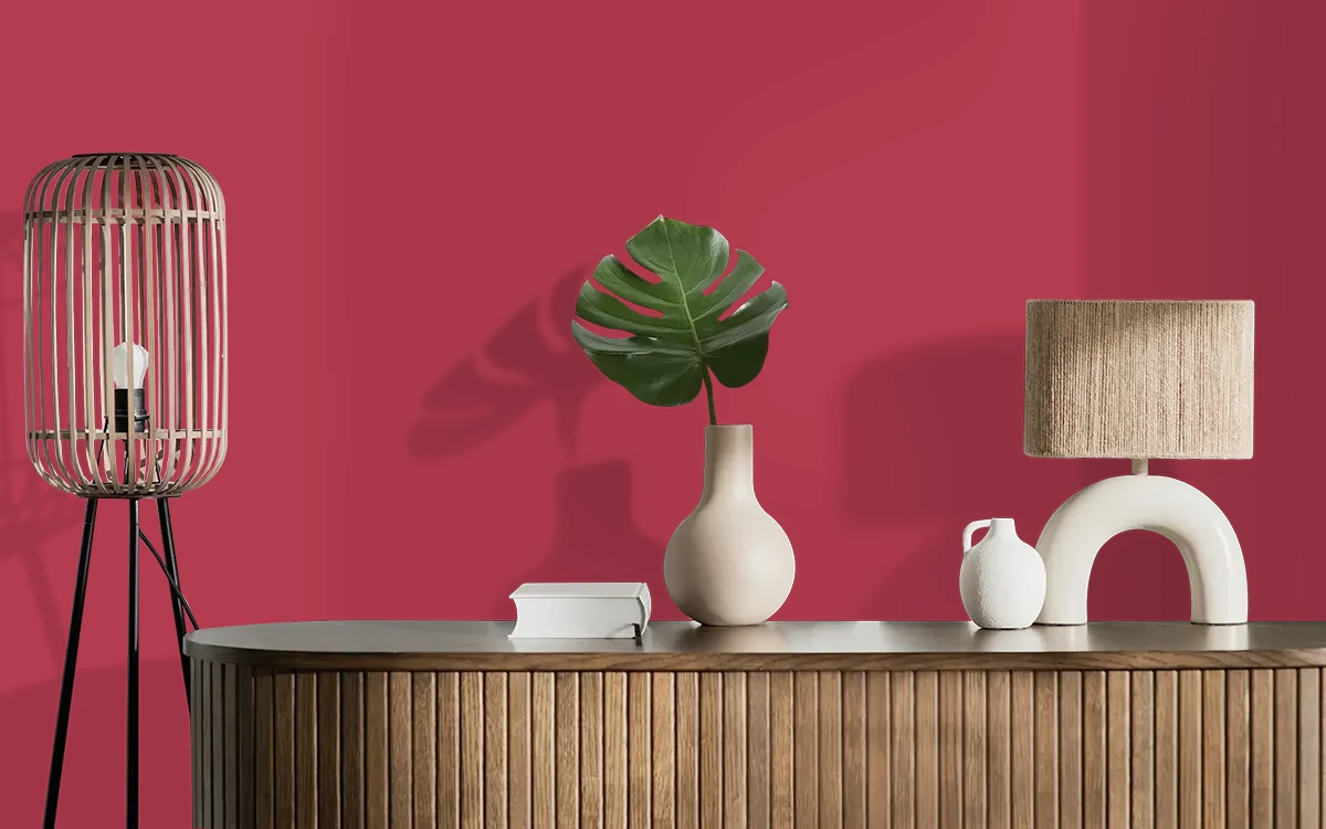 Nippon Paint's DRAMA RED color on different wall surfaces.
