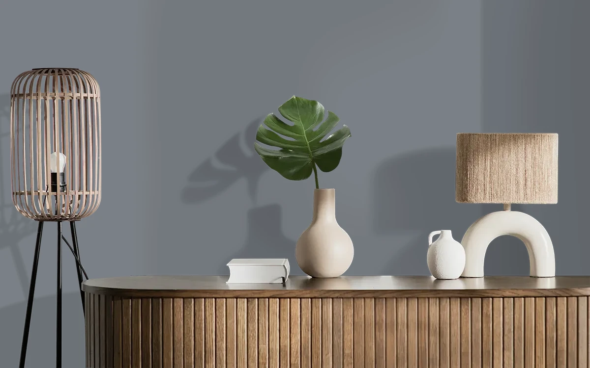 Nippon Paint's EMPIRE GRAY color on different wall surfaces.