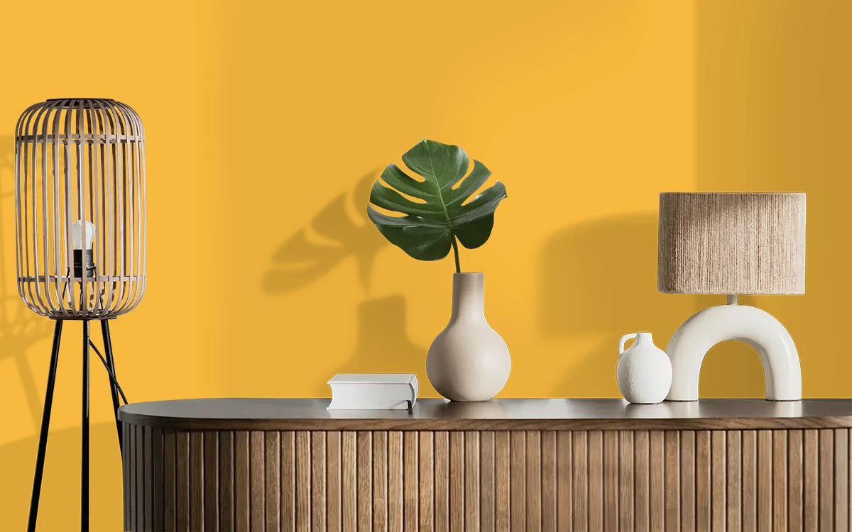 Nippon Paint's EMPRESS GOLD color on different wall surfaces.
