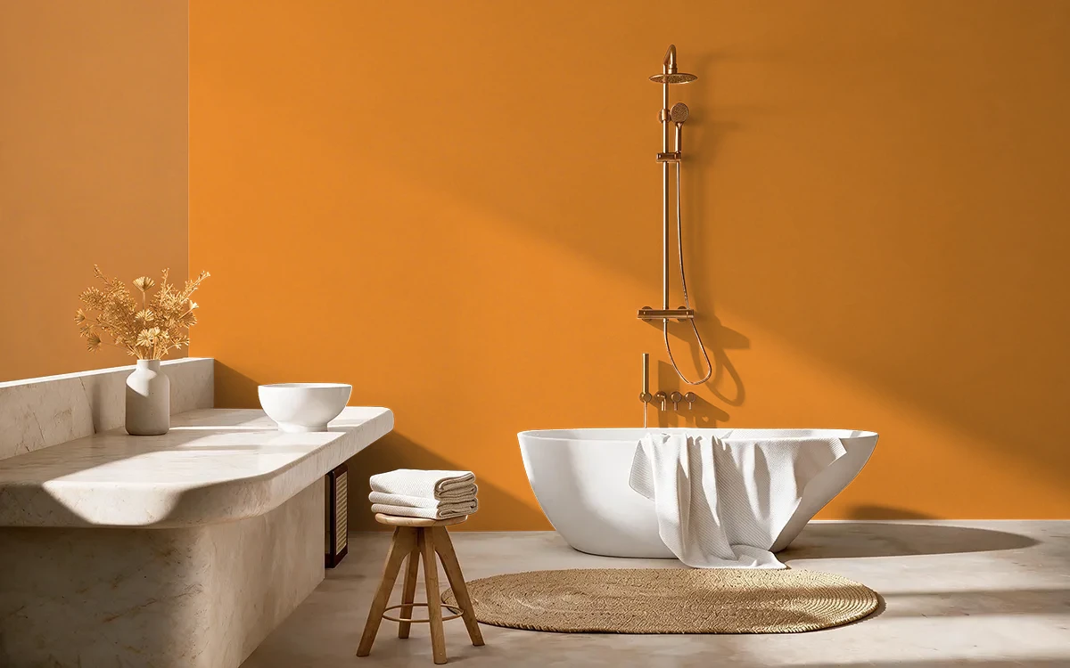 Nippon Paint's FESTIVE ORANGE color on different wall surfaces.