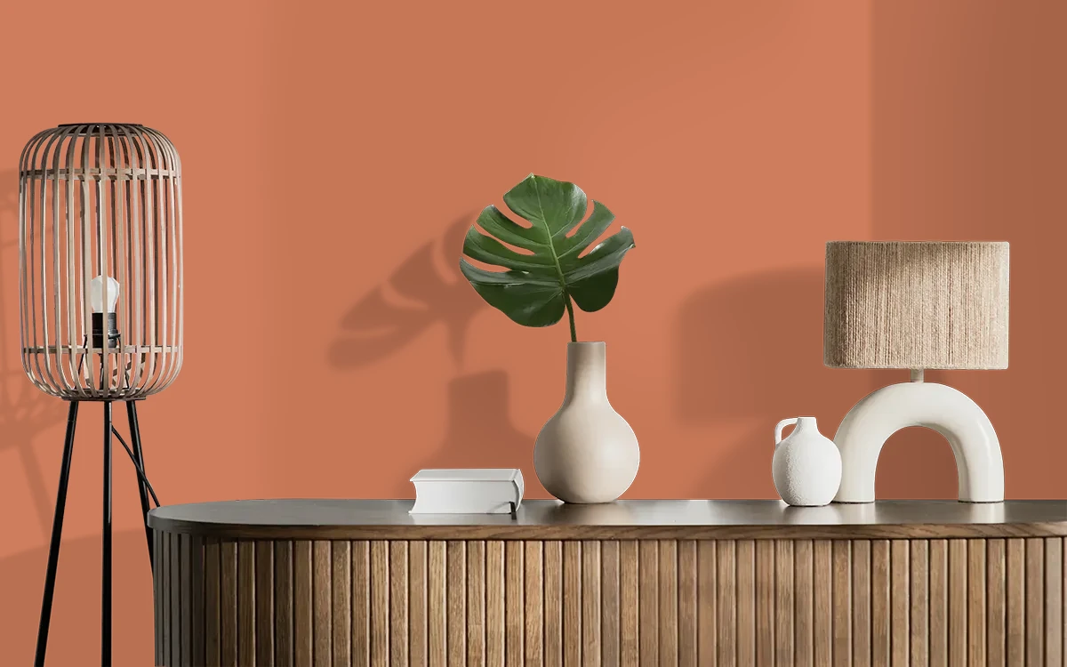 Nippon Paint's FLAME AURA color on different wall surfaces.