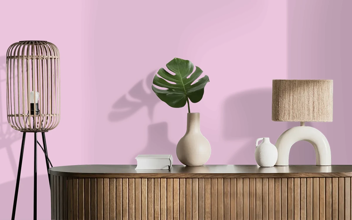 Nippon Paint's FLICKERING PINK color on different wall surfaces.