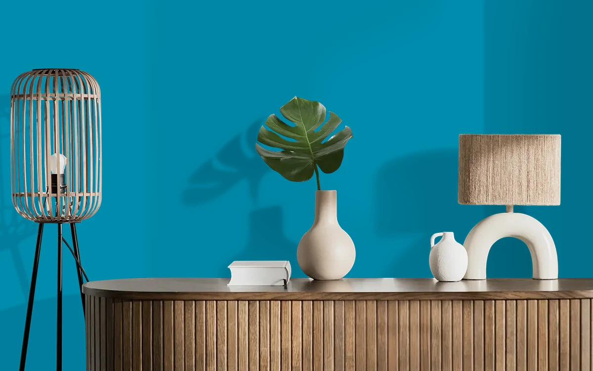 Nippon Paint's FLORENCE BLUE color on different wall surfaces.