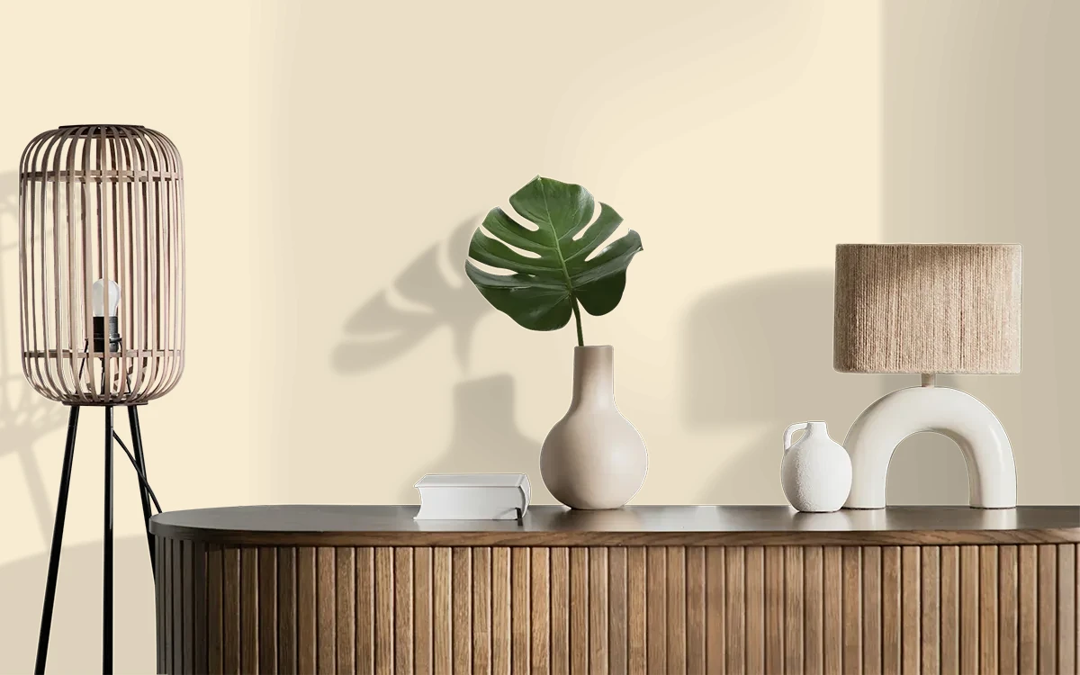 Nippon Paint's FOAMY CREAM color on different wall surfaces.