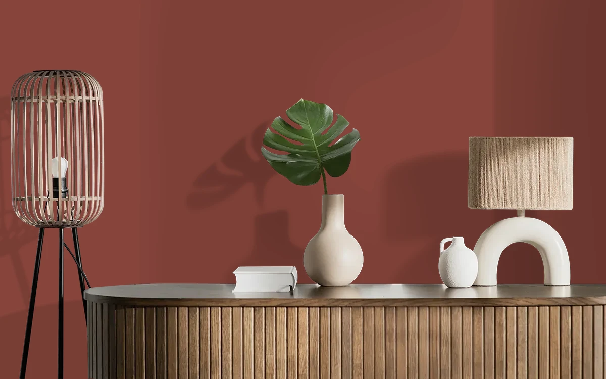 Nippon Paint's GARNET RAGE color on different wall surfaces.