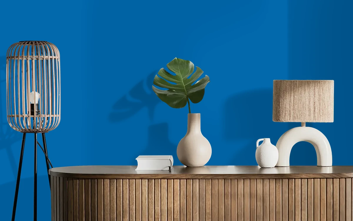 Nippon Paint's GLACIER BLUE color on different wall surfaces.