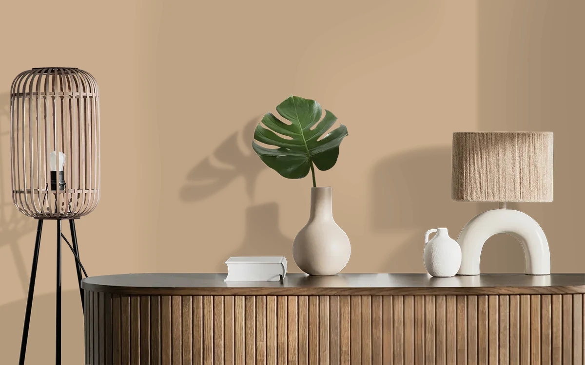 Nippon Paint's GLAZED BRULEE color on different wall surfaces.