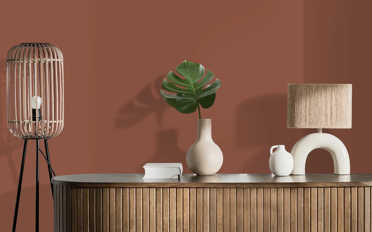 Nippon Paint's GLAZED POTTERY color on different wall surfaces.