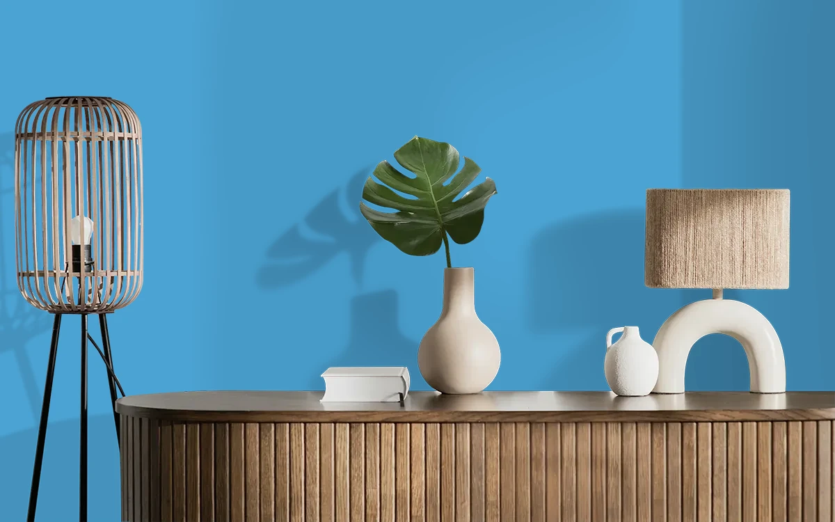 Nippon Paint's GLITZY BLUE color on different wall surfaces.