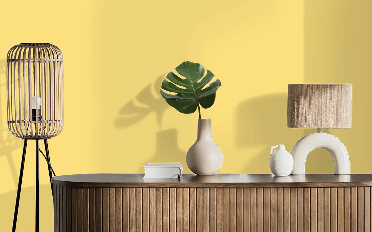 Nippon Paint's GLORY YELLOW color on different wall surfaces.