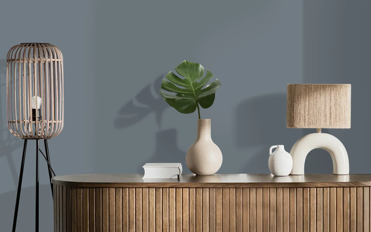 Nippon Paint's GRAY HOOD color on different wall surfaces.