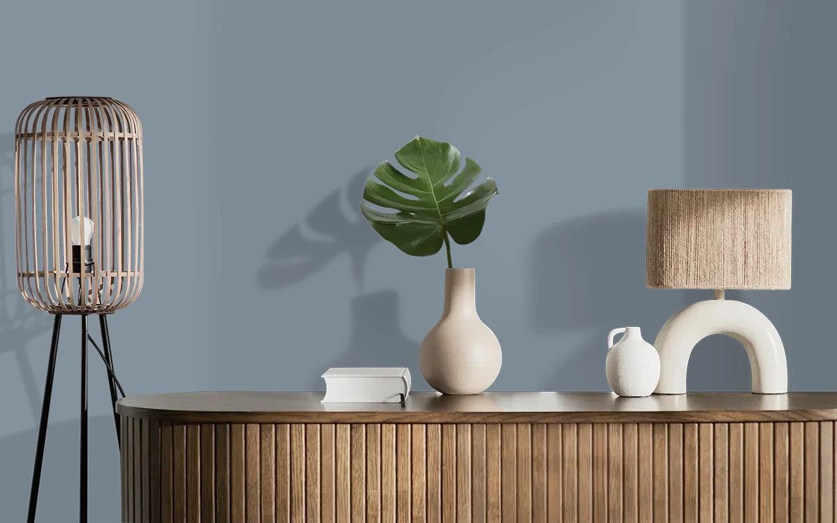 Nippon Paint's GRAY KNIGHT color on different wall surfaces.