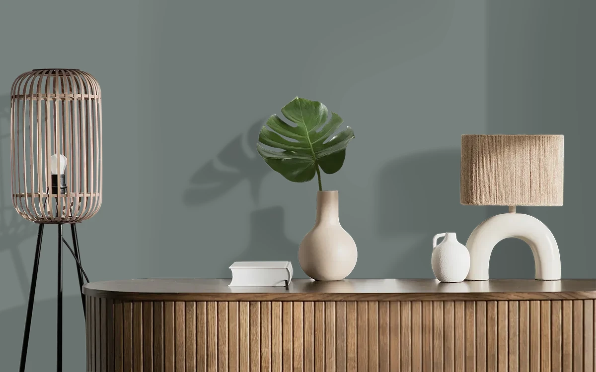 Nippon Paint's GRAY TWISTER color on different wall surfaces.