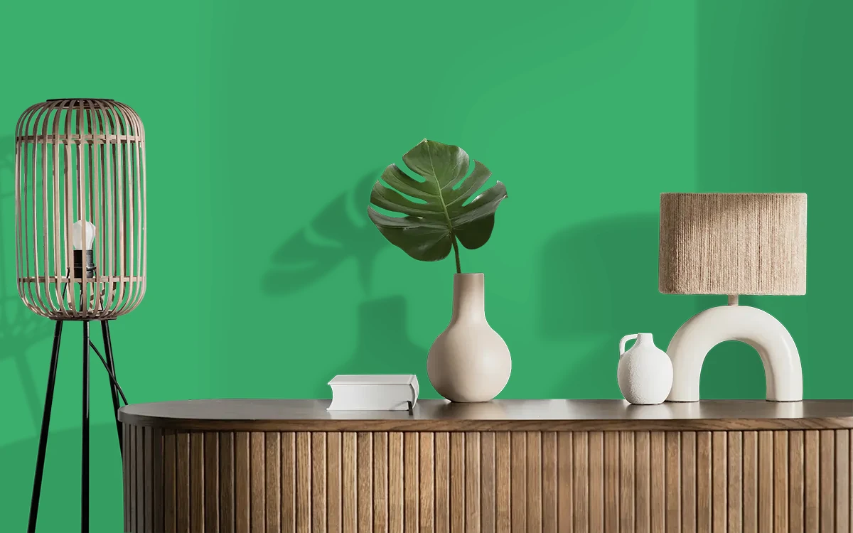 Nippon Paint's GREEN BREAKERS color on different wall surfaces.