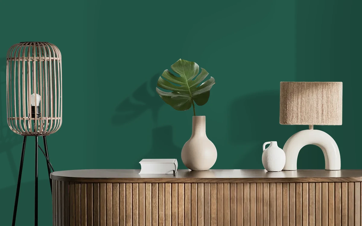 Nippon Paint's GREEN FEATHERS color on different wall surfaces.
