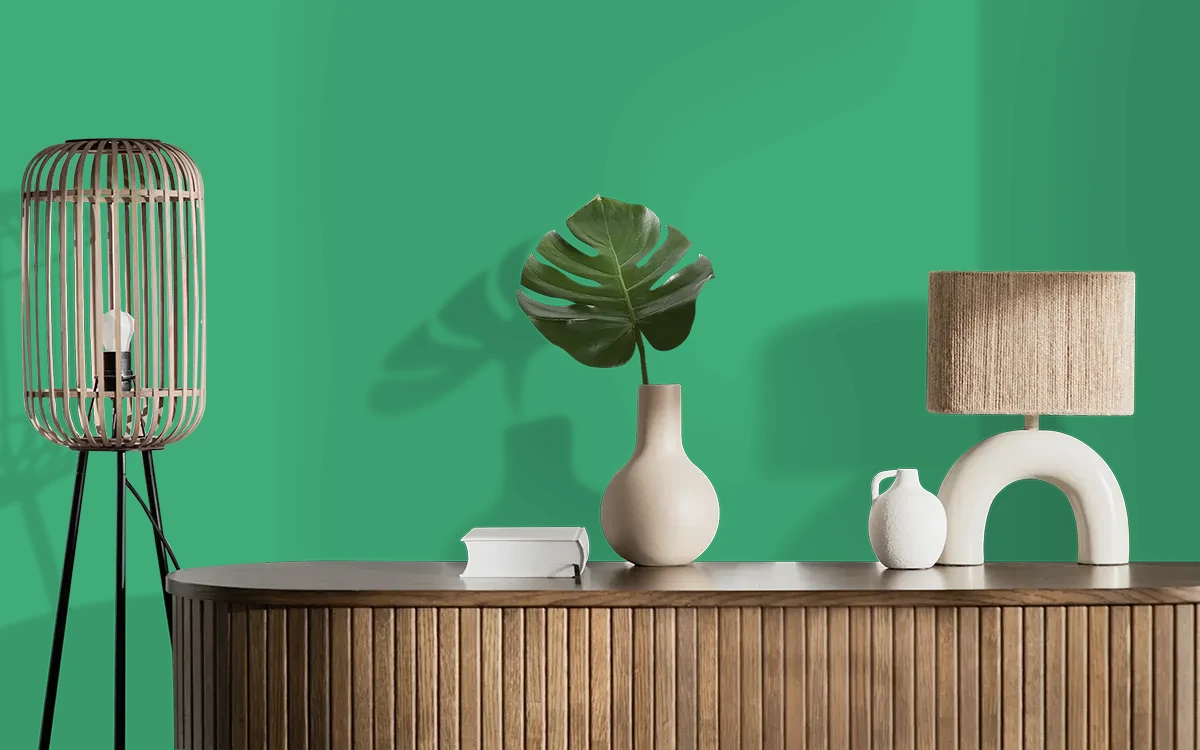 Nippon Paint's GREEN FORTUNE color on different wall surfaces.