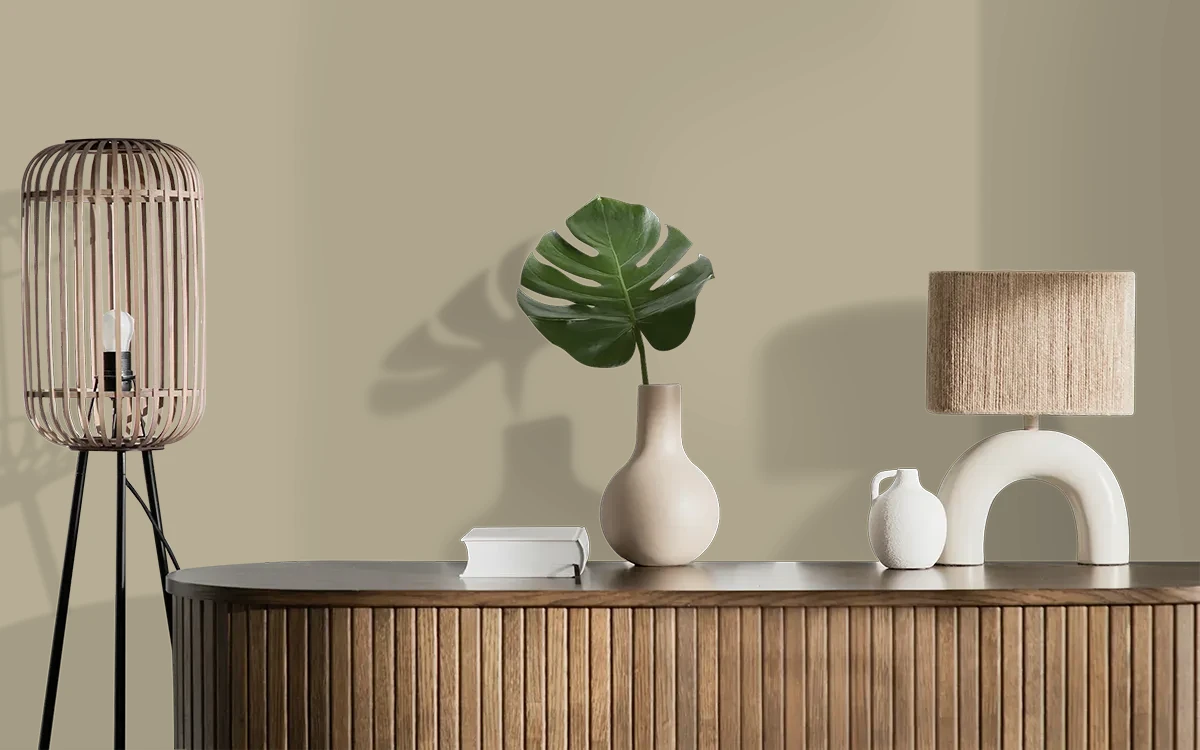 Nippon Paint's GREEN GABLES color on different wall surfaces.