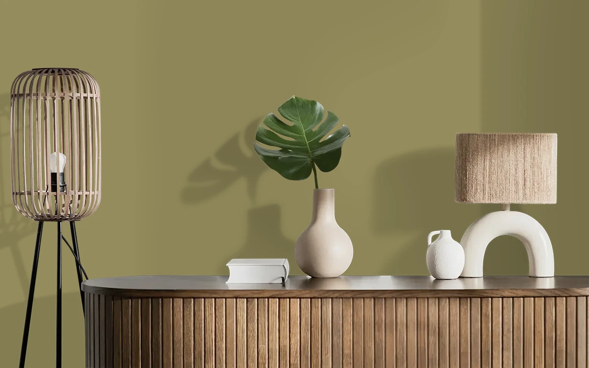 Nippon Paint's GREEN MILE color on different wall surfaces.