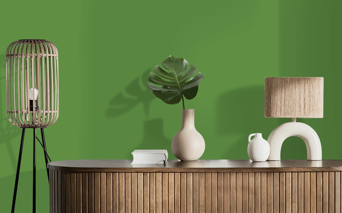 Nippon Paint's GREEN ORCHARD color on different wall surfaces.
