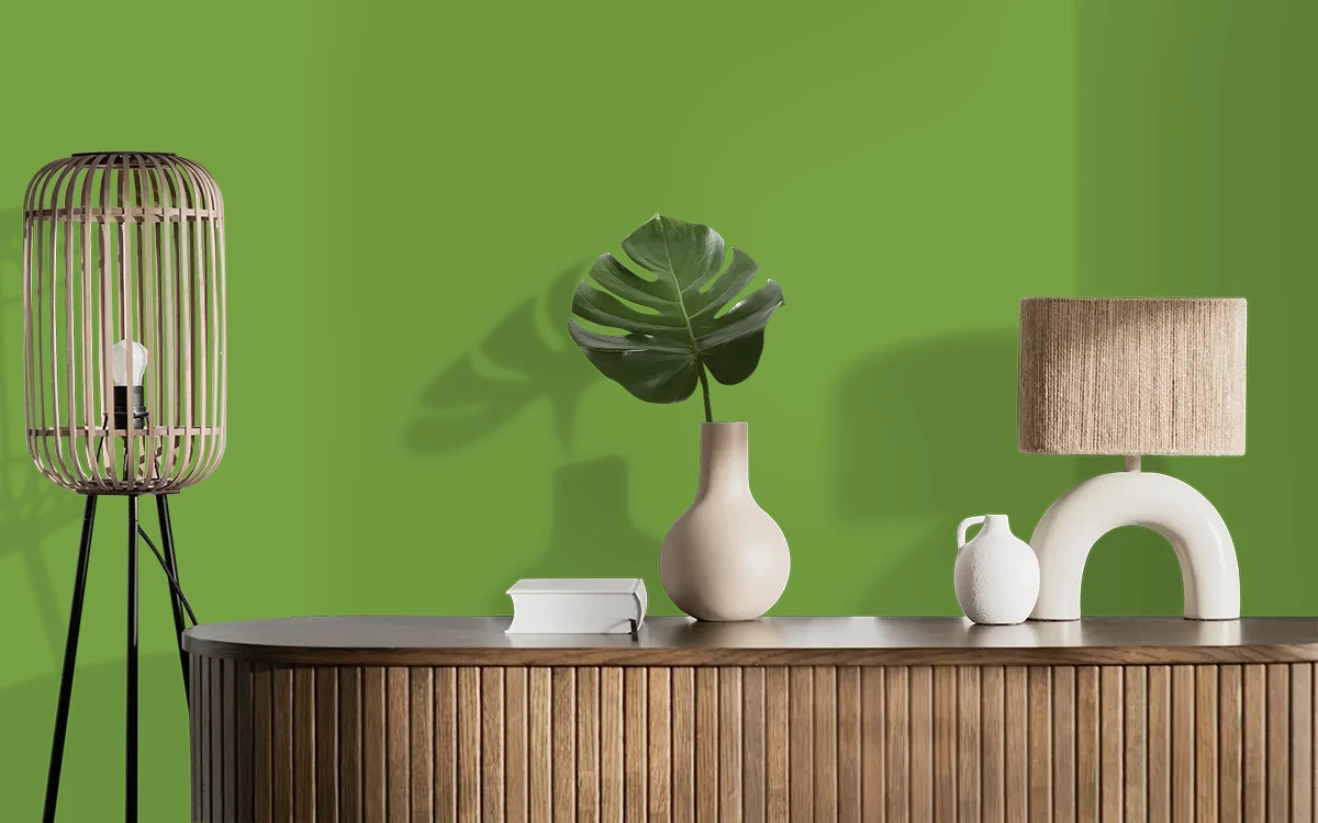 Nippon Paint's GREEN PASTURES color on different wall surfaces.