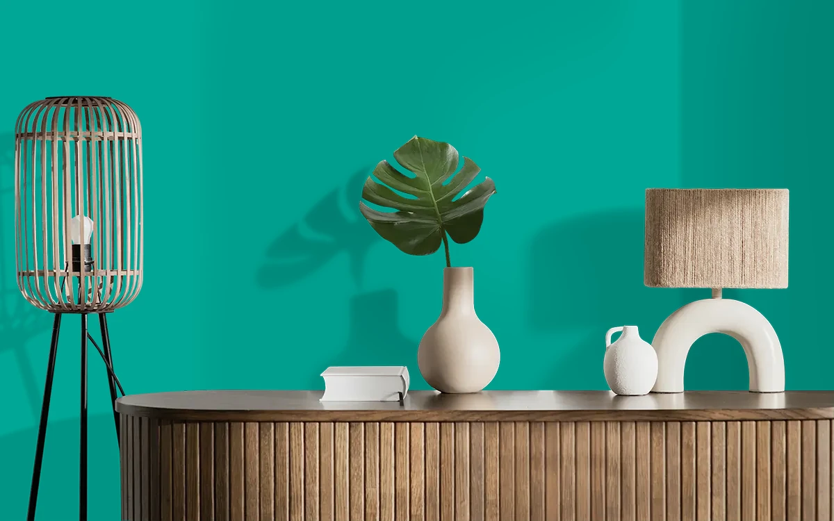 Nippon Paint's GREEN PROMENADE color on different wall surfaces.