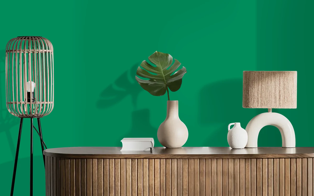 Nippon Paint's GREEN RUNNERS color on different wall surfaces.