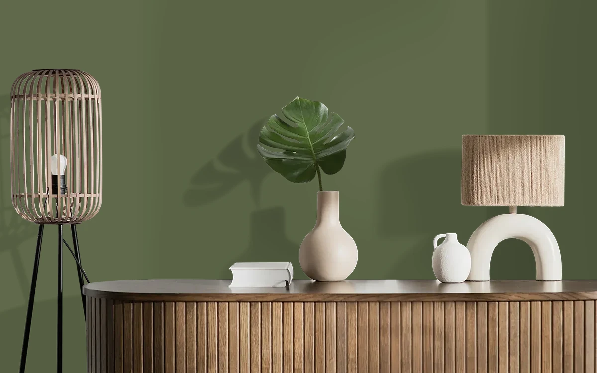 Nippon Paint's GREEN TOPIARY color on different wall surfaces.