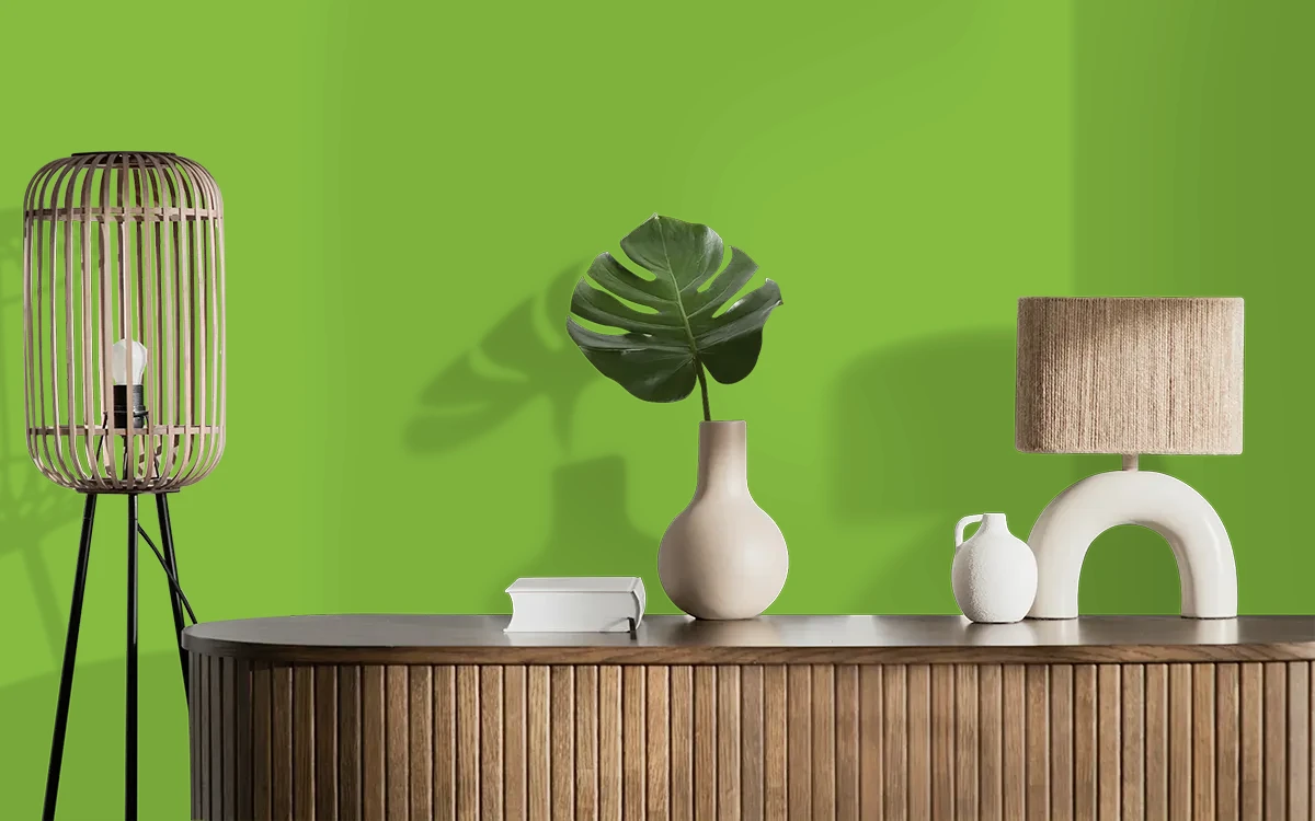 Nippon Paint's GREEN TUFT color on different wall surfaces.