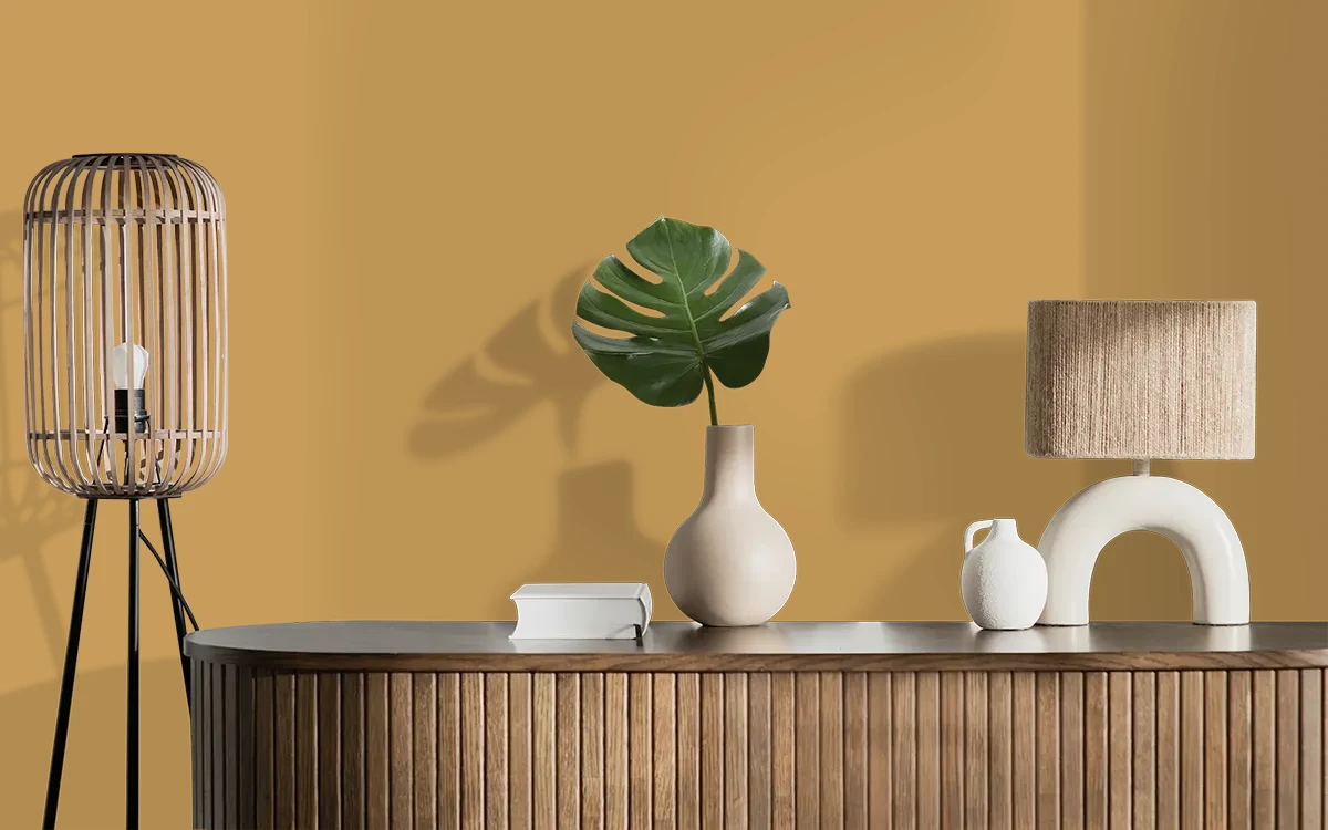 Nippon Paint's HARVEST FLAME color on different wall surfaces.
