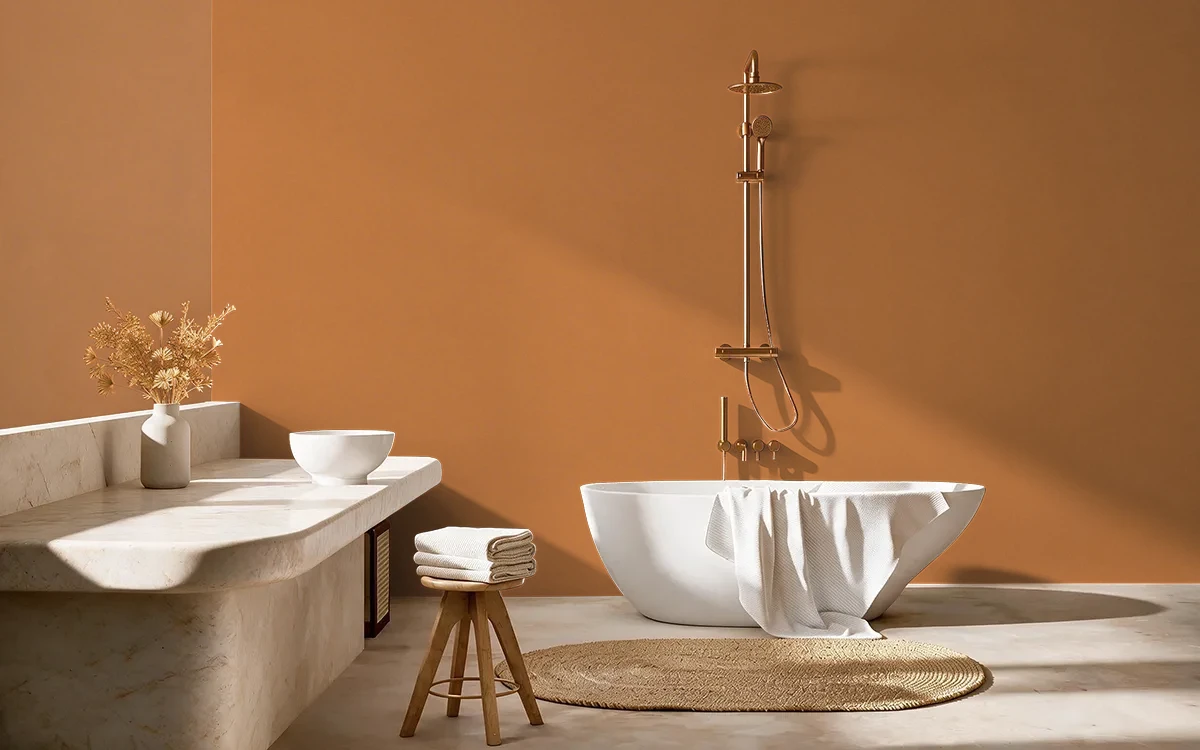 Nippon Paint's HARVEST ORANGE color on different wall surfaces.