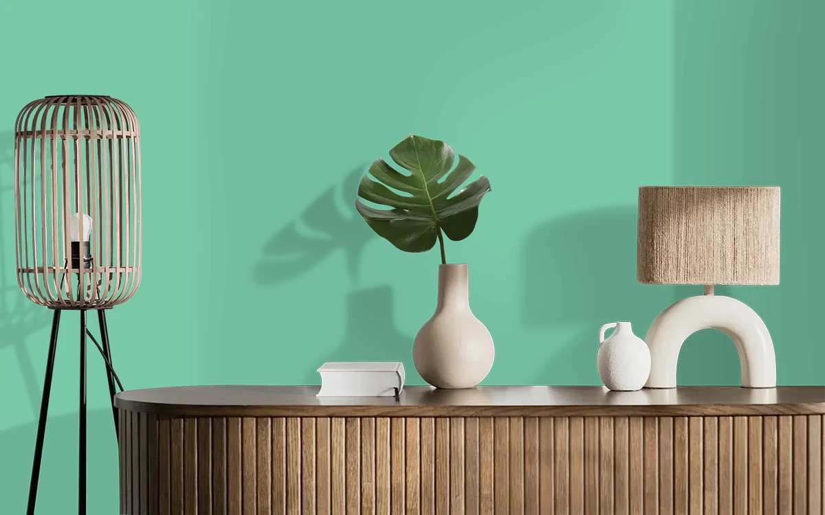 Nippon Paint's HAWAIIAN GROVE color on different wall surfaces.