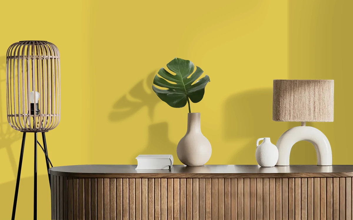Nippon Paint's HEART OF GOLD color on different wall surfaces.
