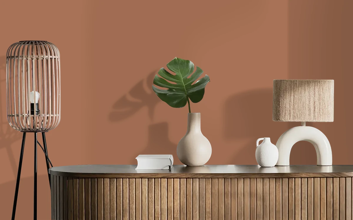 Nippon Paint's HENNA FLARE color on different wall surfaces.