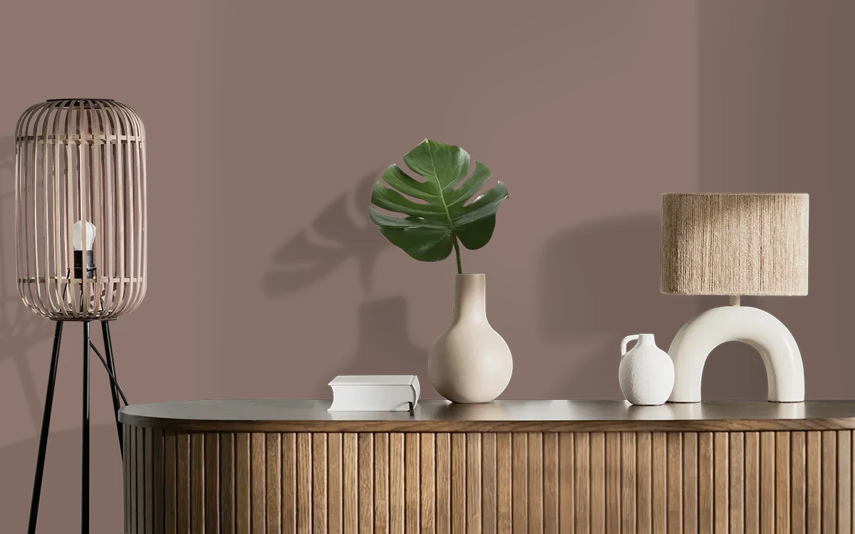 Nippon Paint's HENNA RADIANCE color on different wall surfaces.