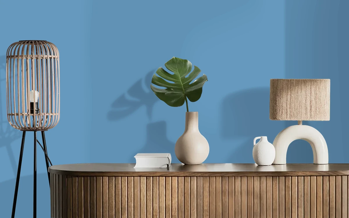 Nippon Paint's HIDDEN BLUE color on different wall surfaces.