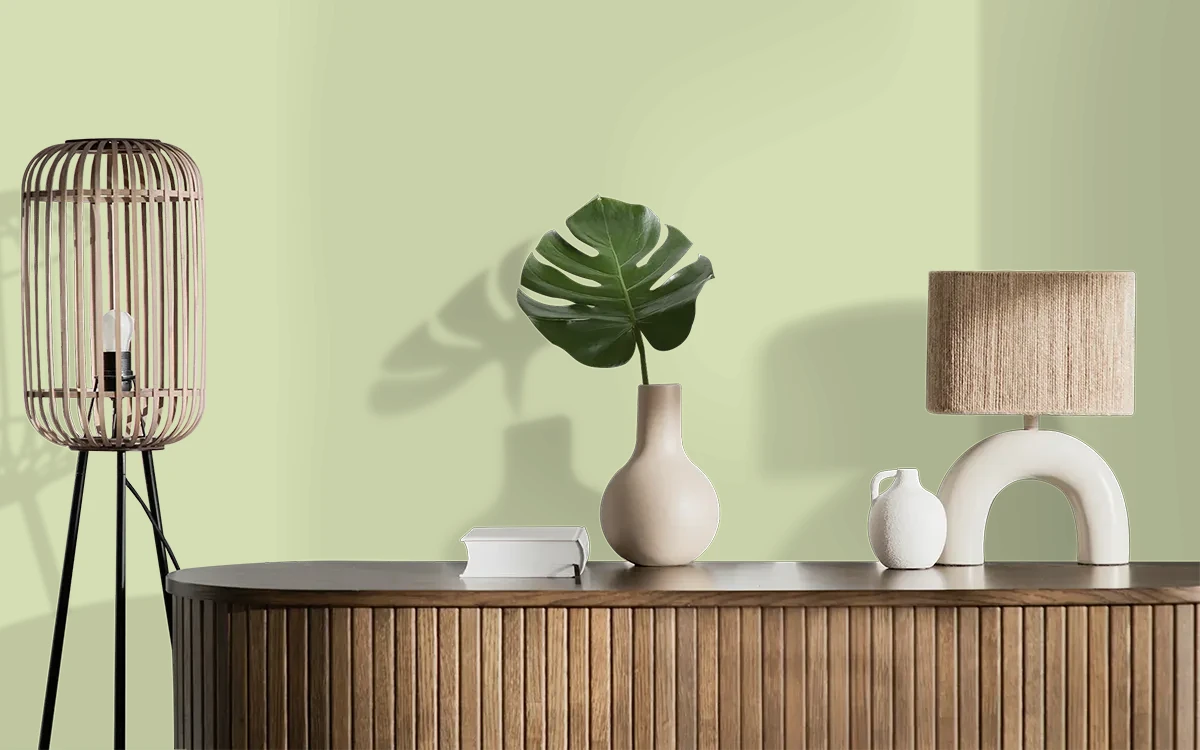 Nippon Paint's HIDDEN GREEN color on different wall surfaces.
