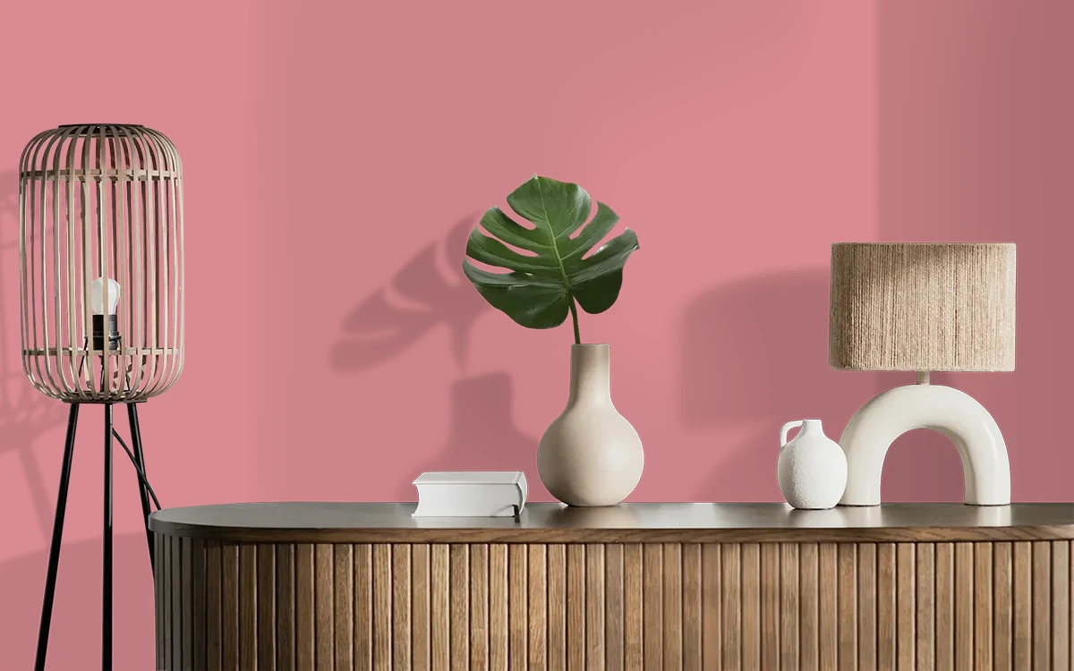 Nippon Paint's HILL CHERRY color on different wall surfaces.