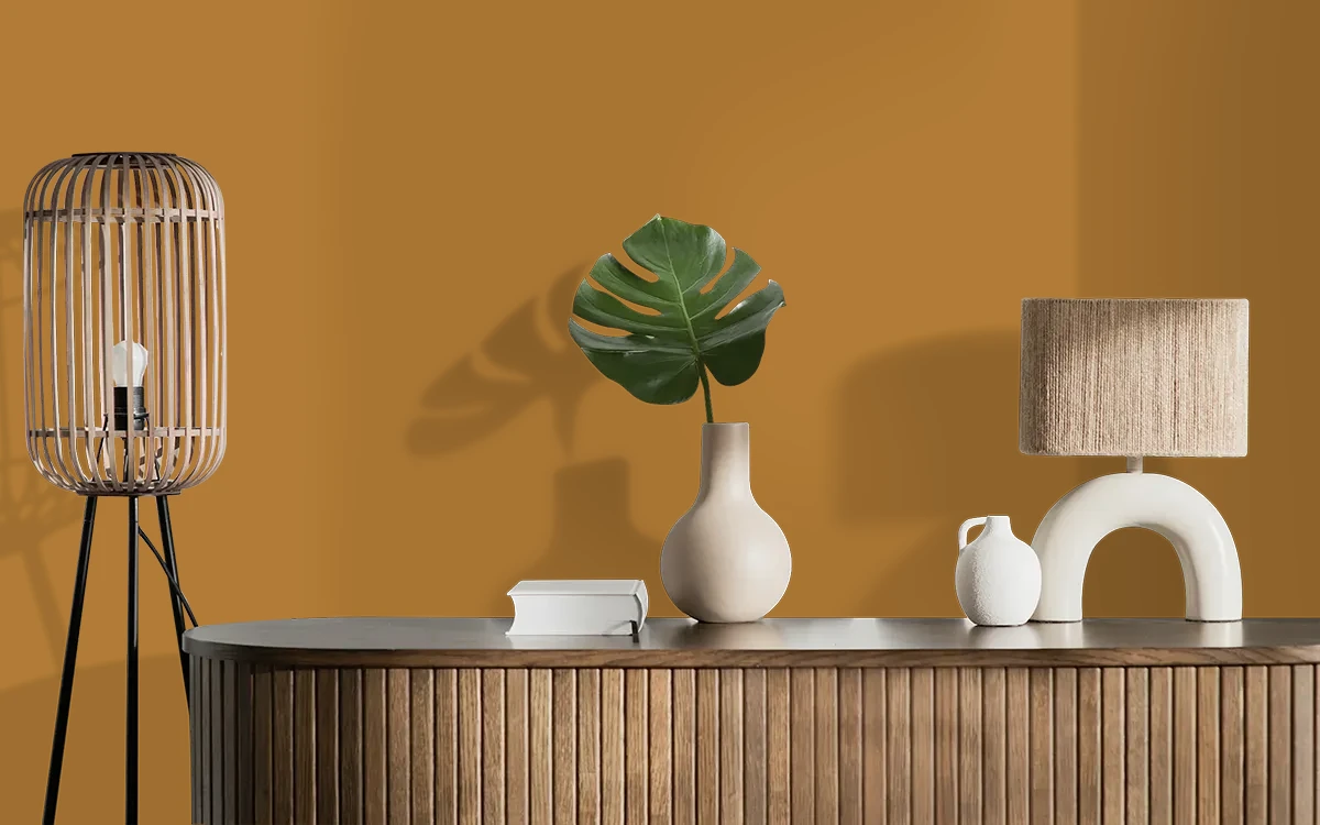 Nippon Paint's HONEY MELT color on different wall surfaces.