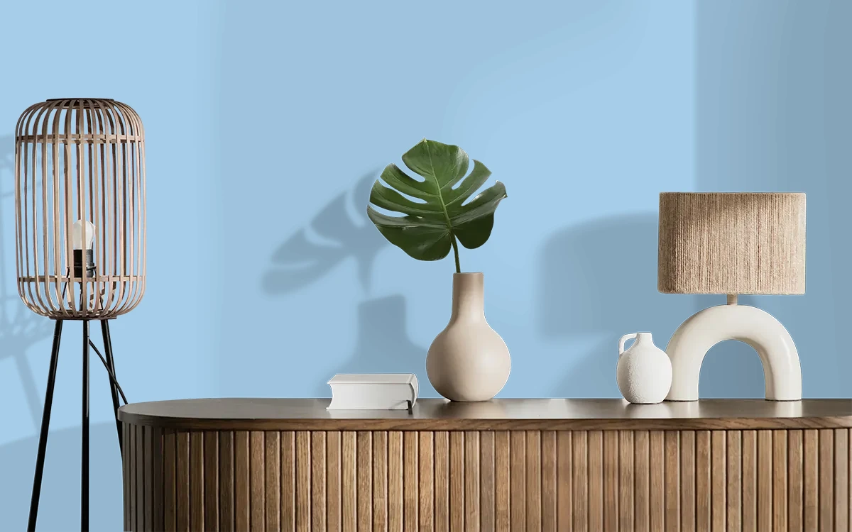 Nippon Paint's ICY WATERS color on different wall surfaces.