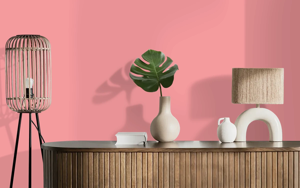 Nippon Paint's IMPATIENS PINK color on different wall surfaces.