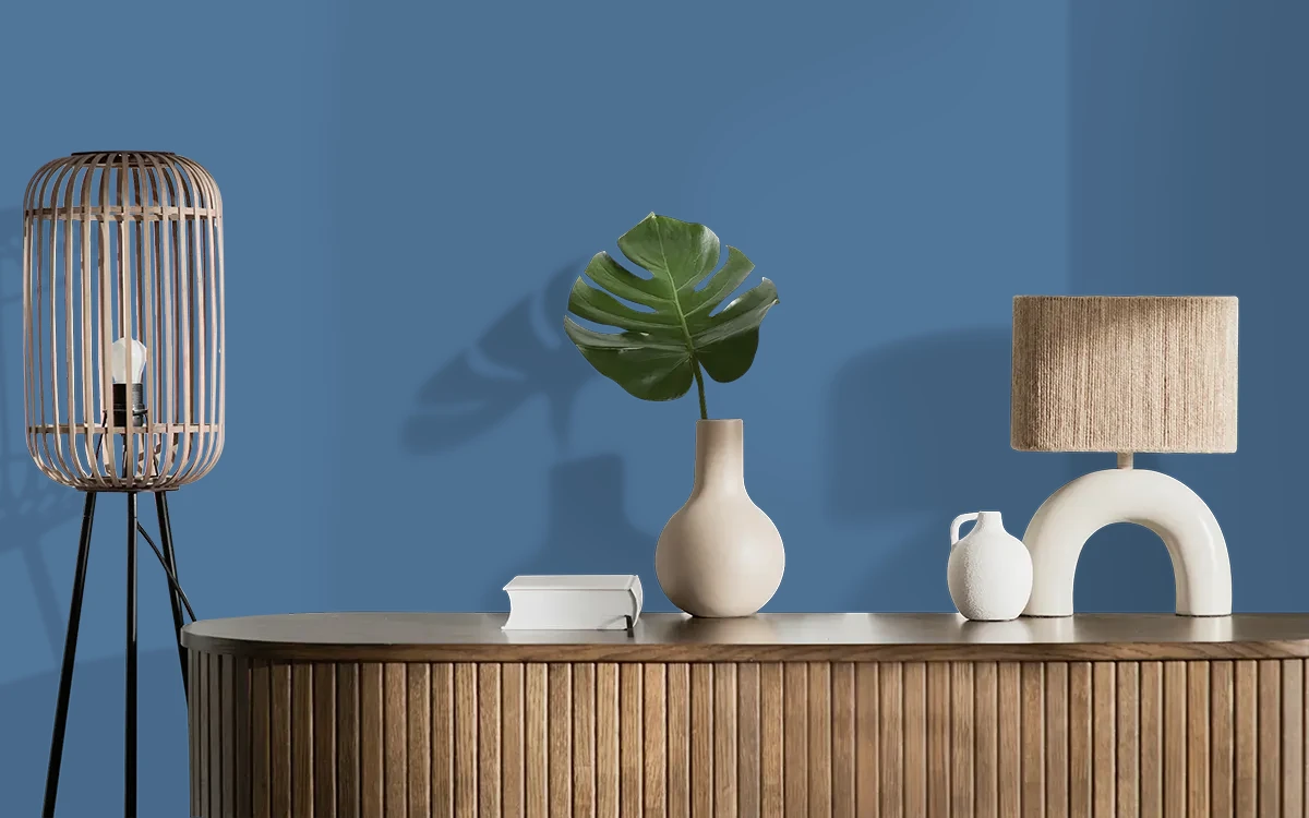 Nippon Paint's IMPERIAL BLUE color on different wall surfaces.