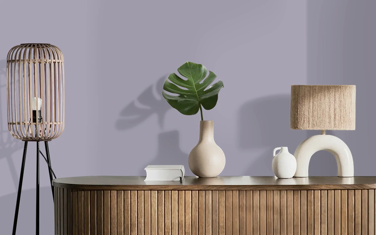 Nippon Paint's INDIGO AURA color on different wall surfaces.