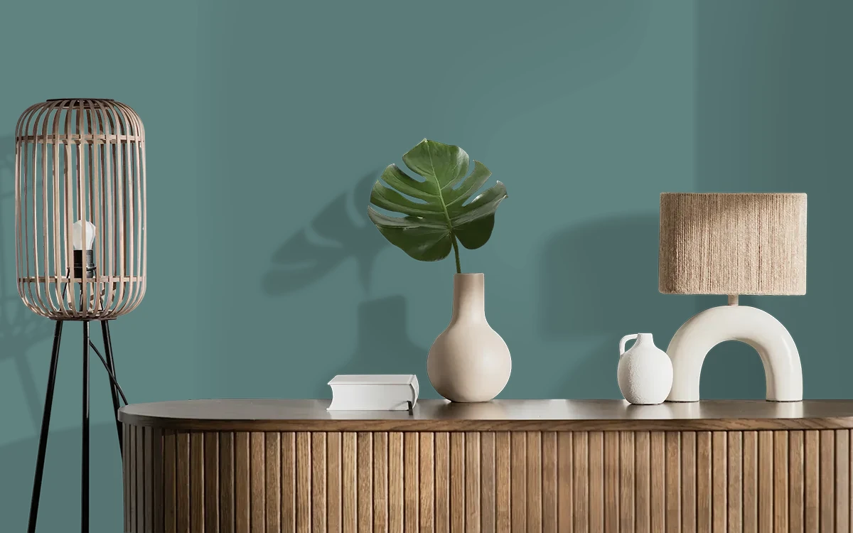 Nippon Paint's ISLE IN THE SEA color on different wall surfaces.