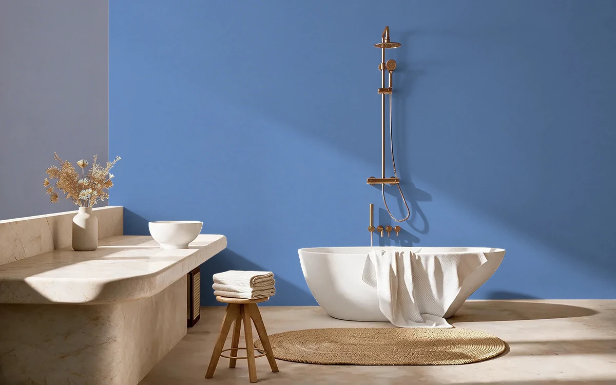 Nippon Paint's JOVIAL BLUE color on different wall surfaces.