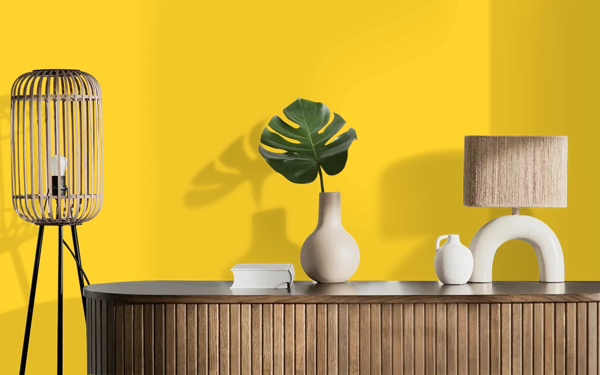 Nippon Paint's JUMPING FOR JOY color on different wall surfaces.