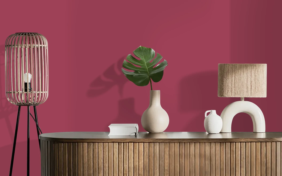 Nippon Paint's KEEPSAKE ROSE color on different wall surfaces.