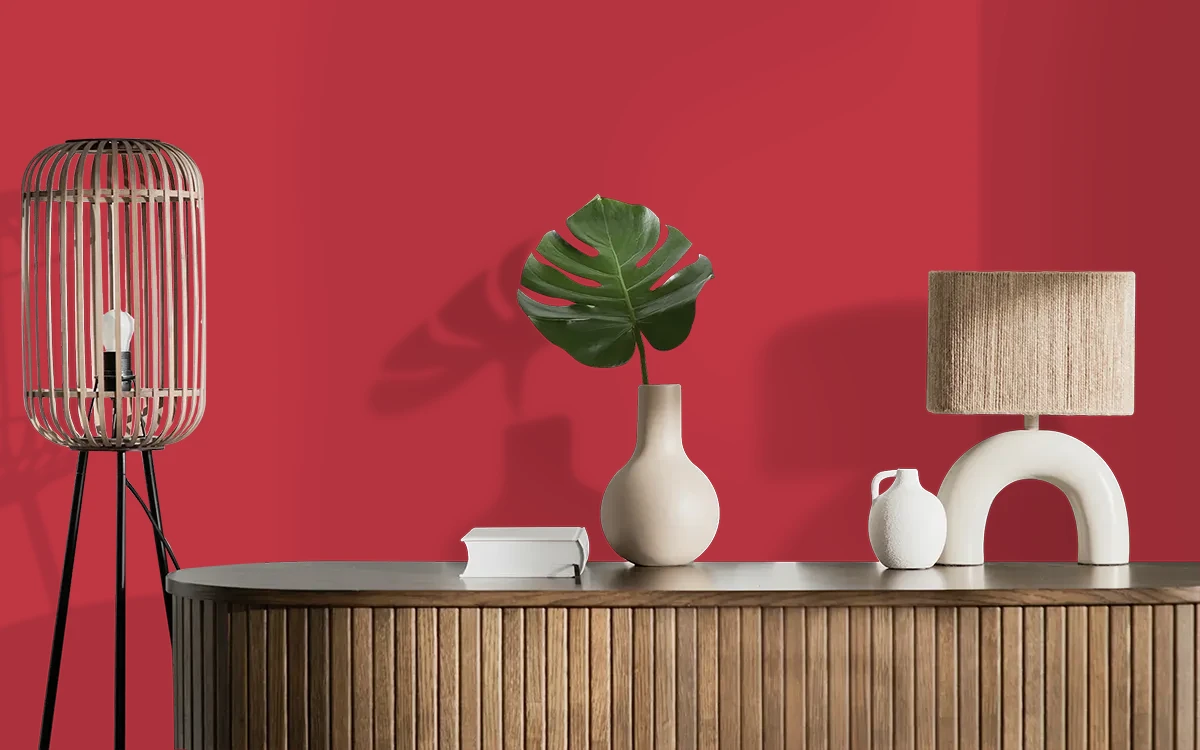 Nippon Paint's KNOCKOUT RED color on different wall surfaces.