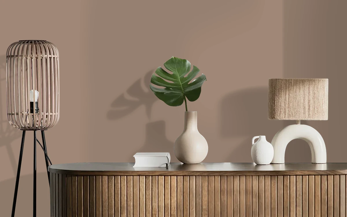 Nippon Paint's LEATHER GLOVES color on different wall surfaces.