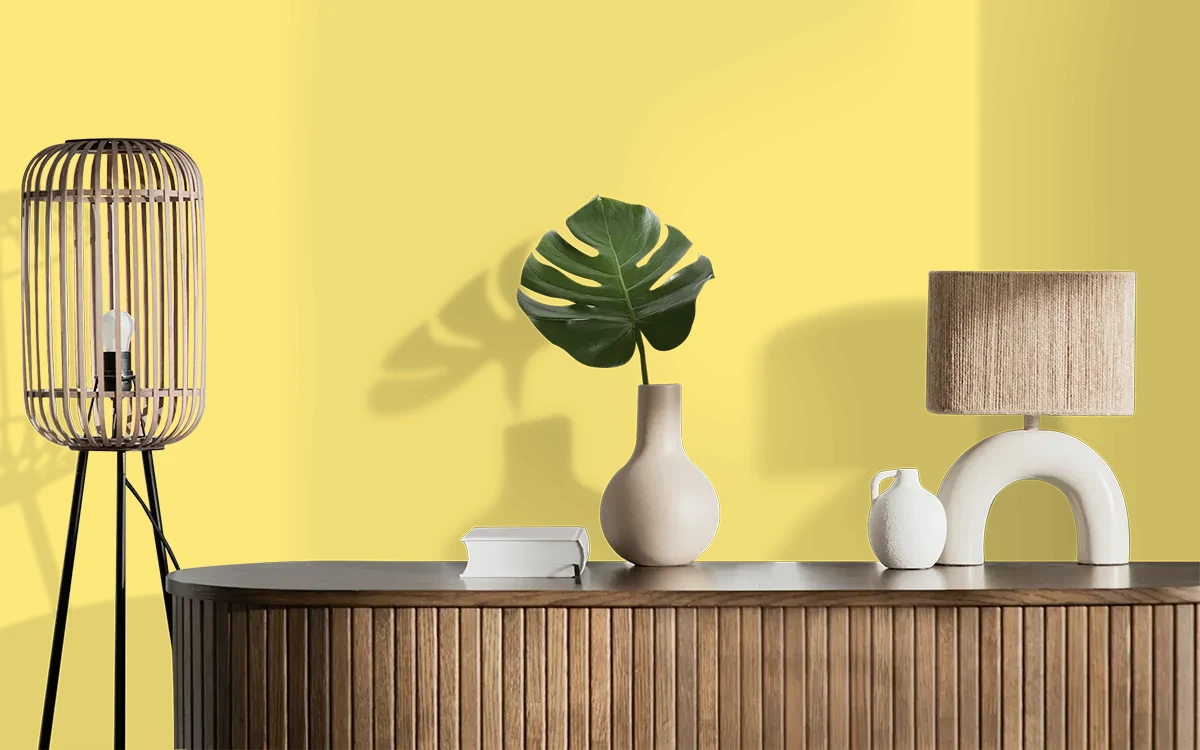 Nippon Paint's LEMON CHIFFON color on different wall surfaces.