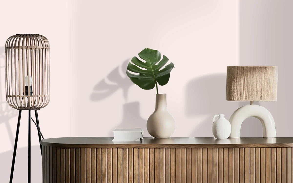 Nippon Paint's LIGHTLY PINK color on different wall surfaces.